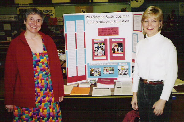 Photo of Michele and Loretta with Coalition Display
